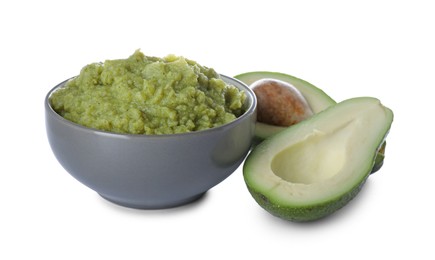 Photo of Delicious avocado puree and fresh fruit on white background. Healthy food