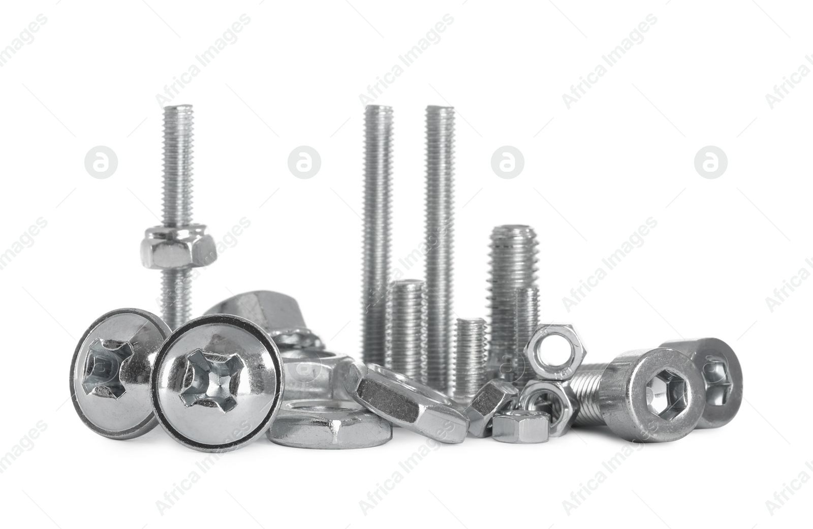 Photo of Different metal bolts and nuts on white background