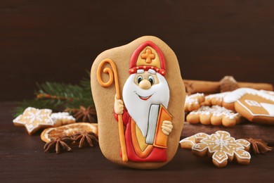 Tasty gingerbread cookies on wooden table. St. Nicholas Day celebration