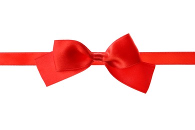 Red ribbon with bow on white background. Festive decoration