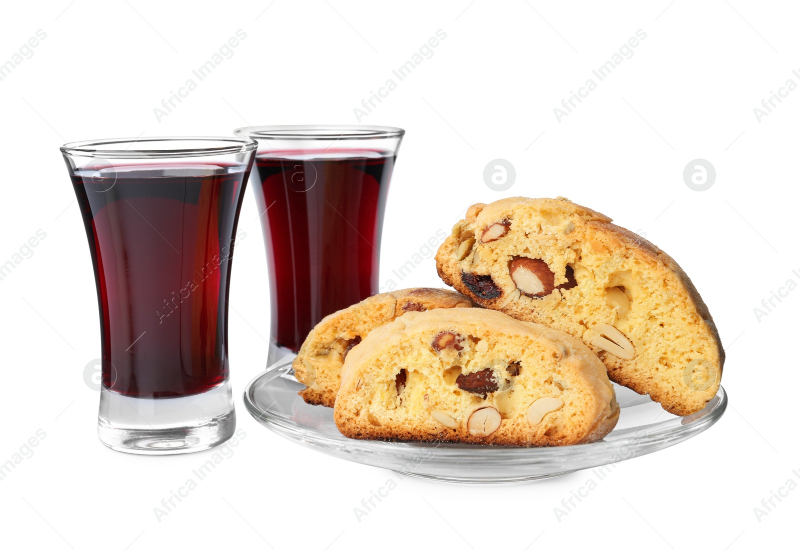 Photo of Tasty cantucci and glasses of liqueur on white background. Traditional Italian almond biscuits