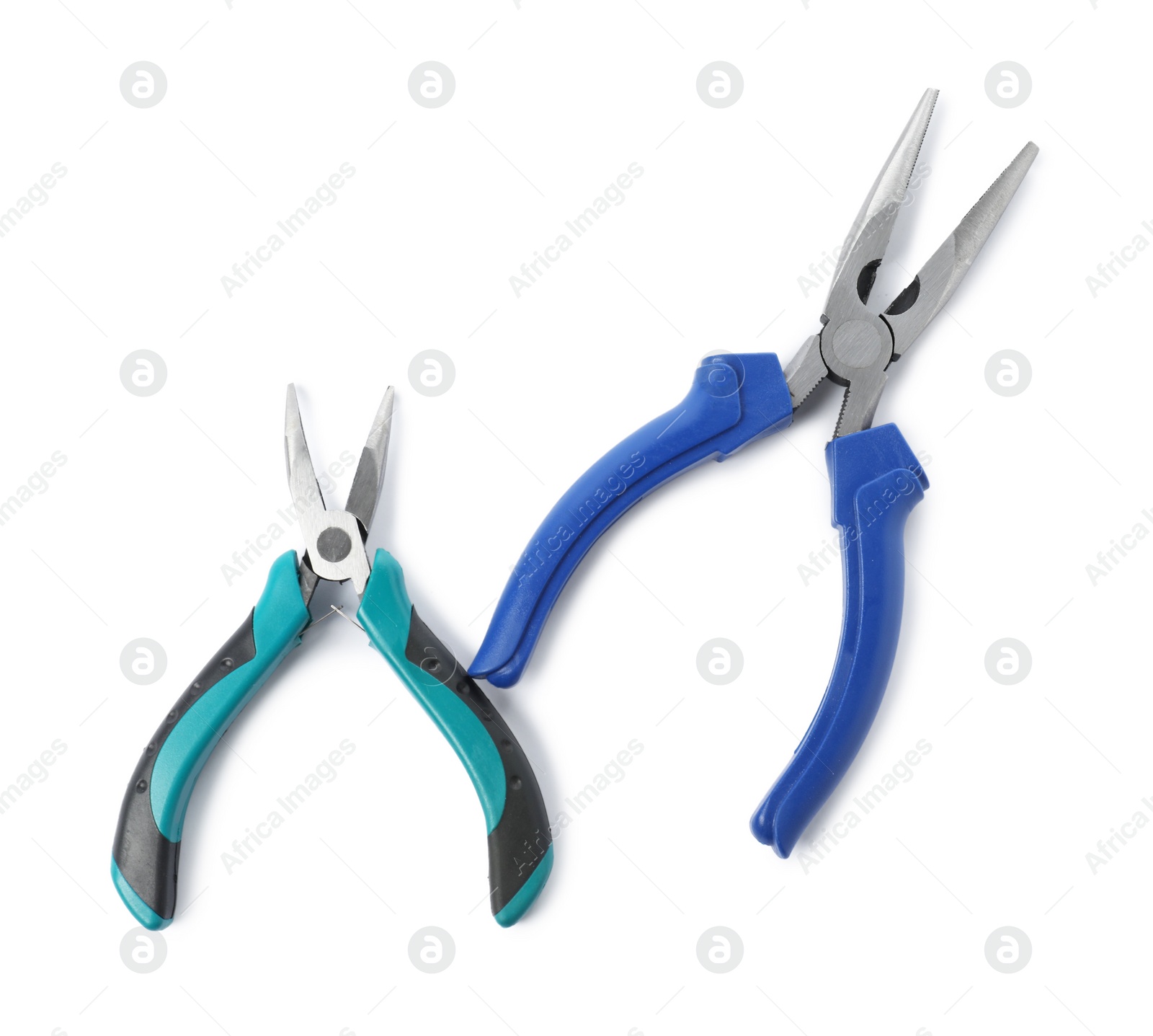 Photo of Different pliers isolated on white, top view