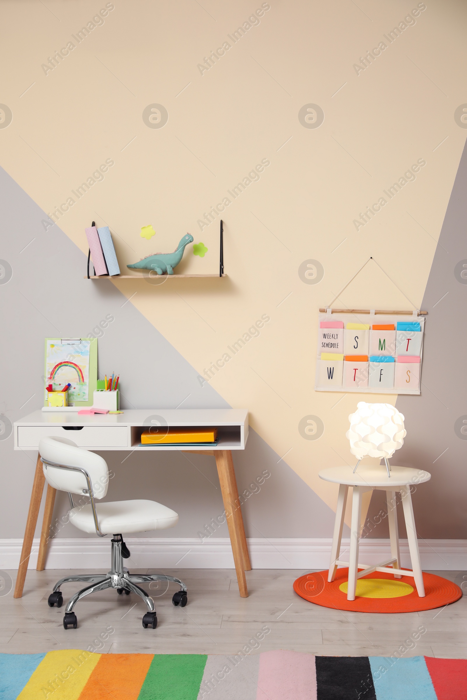 Photo of Stylish child room interior with modern furniture