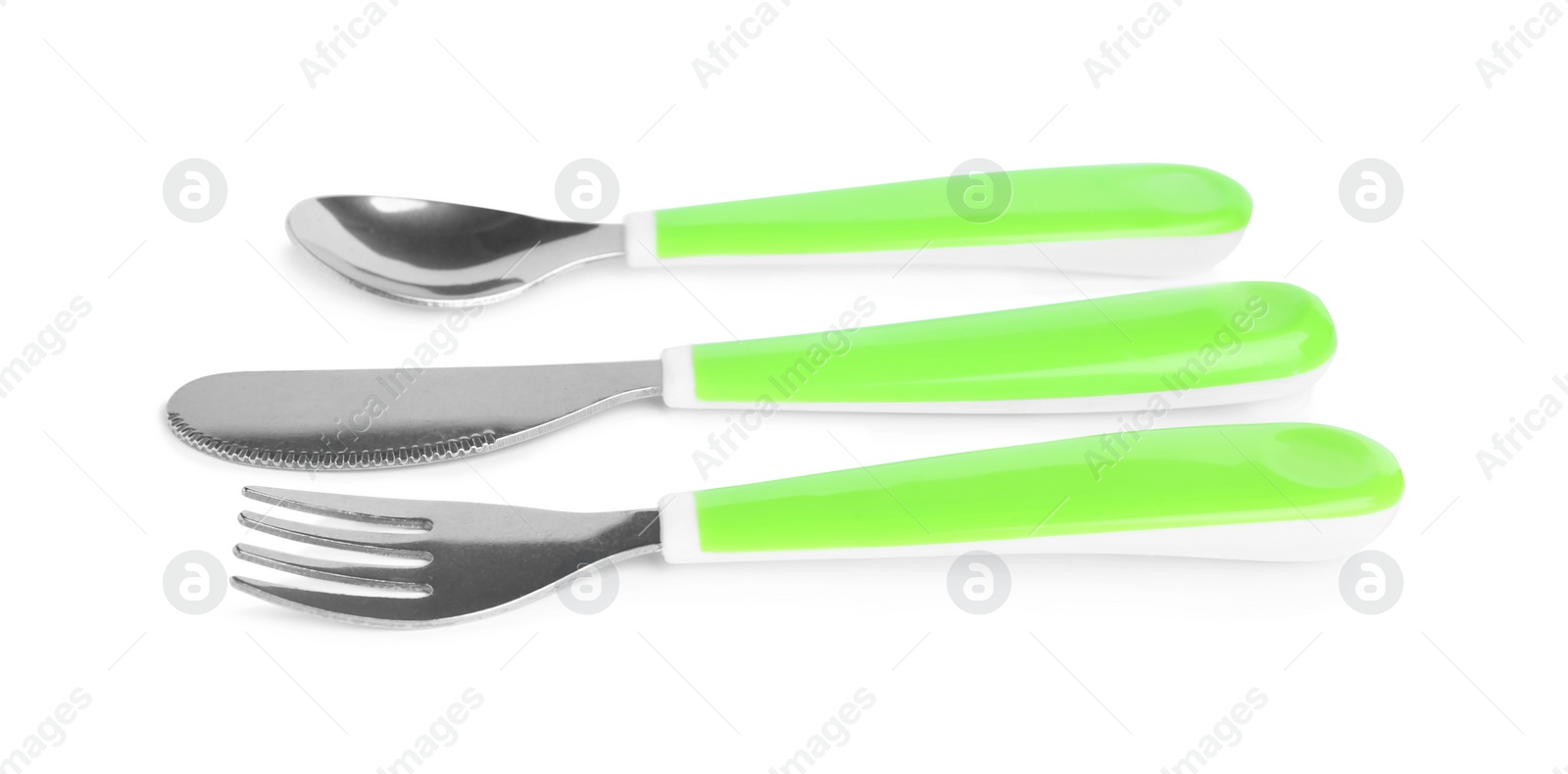 Photo of Set of small cutlery isolated on white. Serving baby food