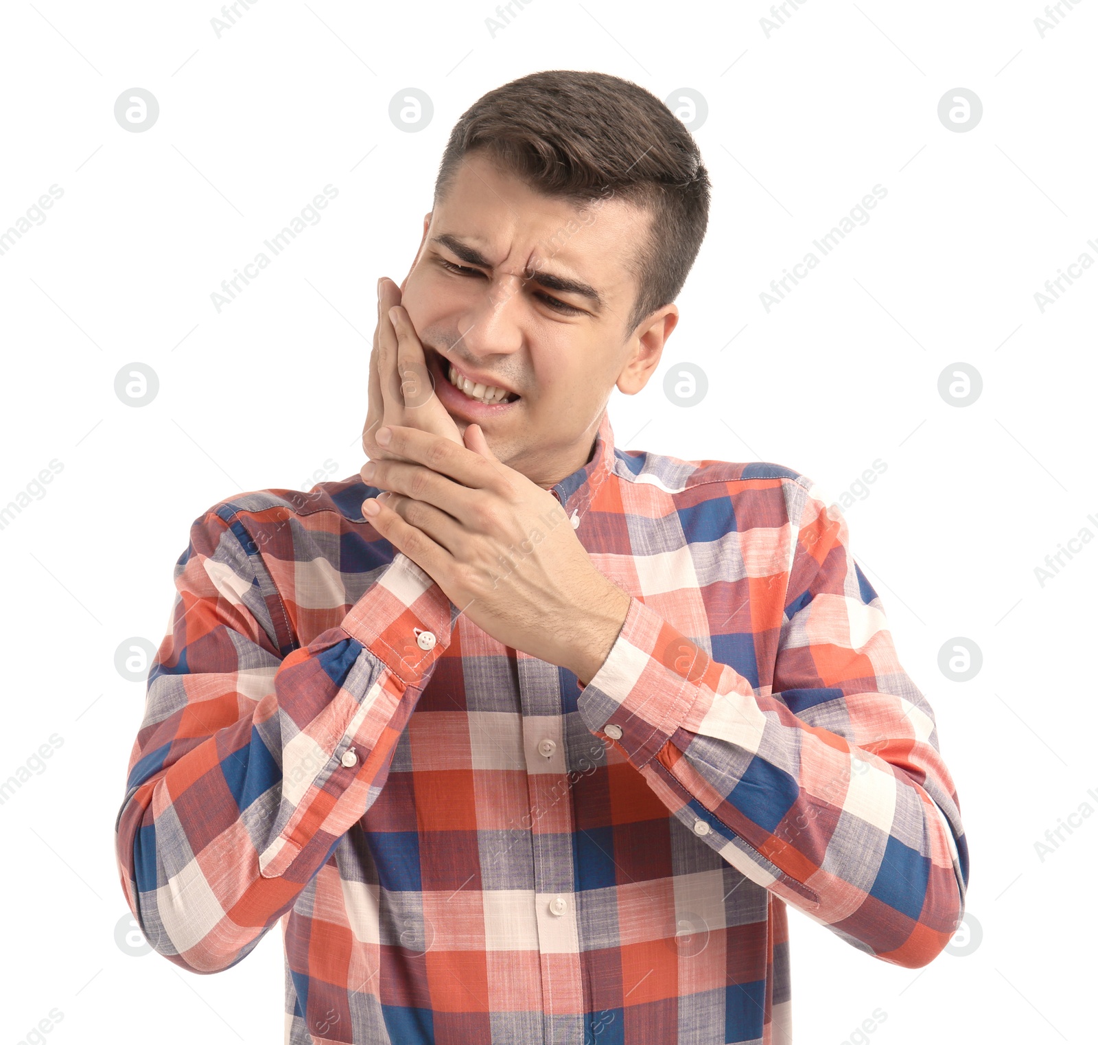 Photo of Young man suffering from toothache on white background