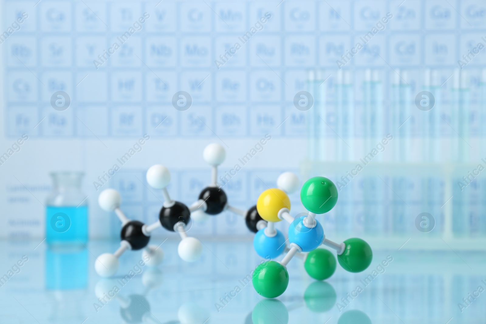 Photo of Molecular model on light surface against blurred background