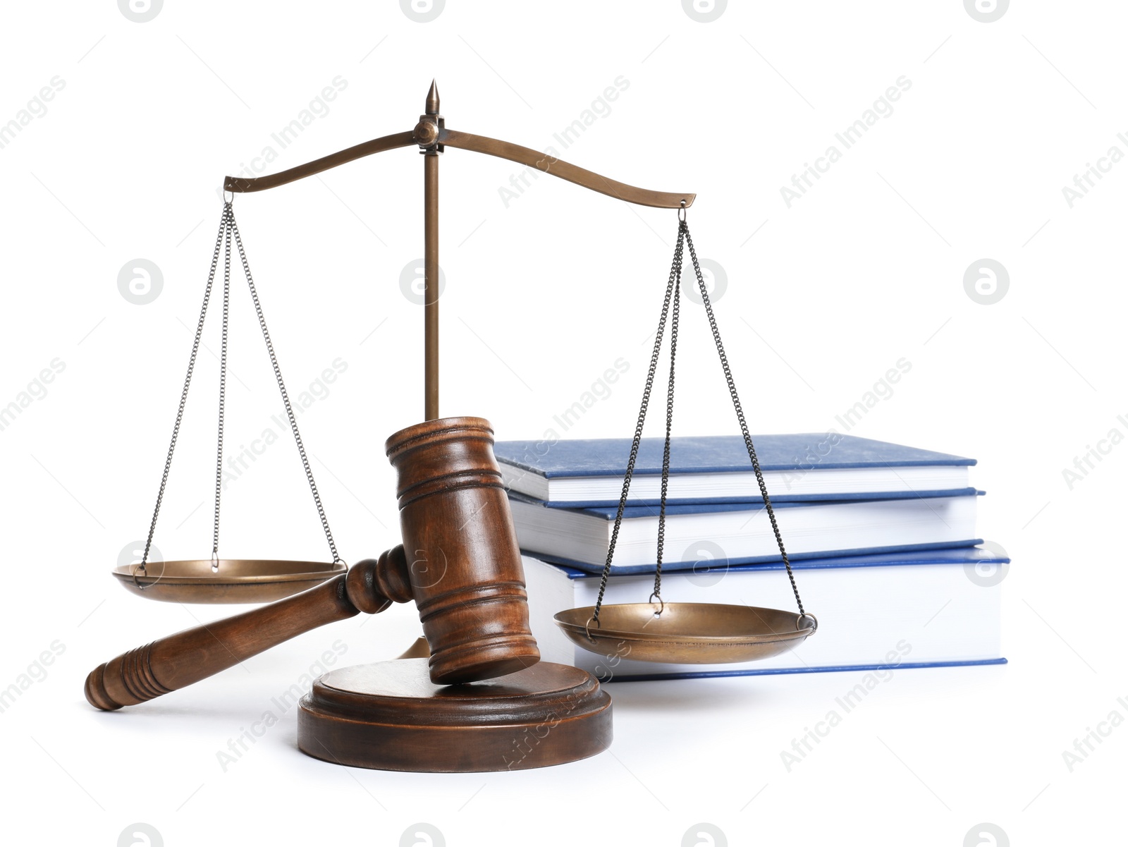 Photo of Wooden gavel, scales of justice and books on white background. Law concept