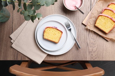 Tasty sweet cake with cream served on wooden table, flat lay