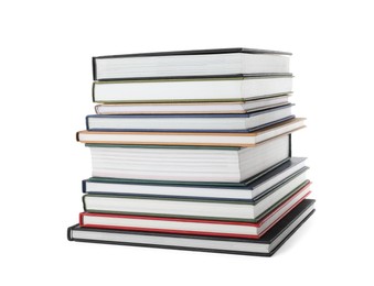 Photo of Stack of hardcover books on white background