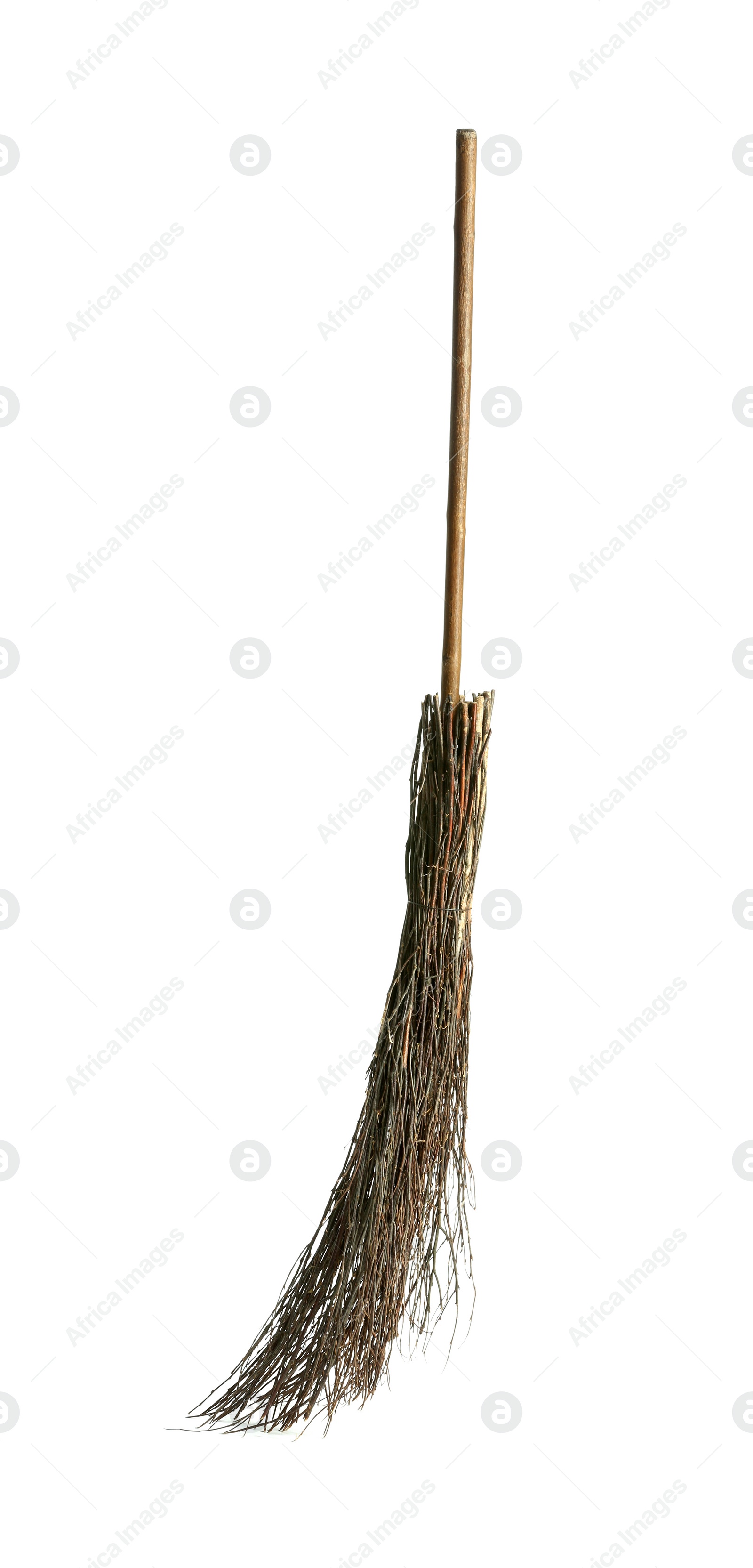 Photo of Old broom with wooden handle isolated on white