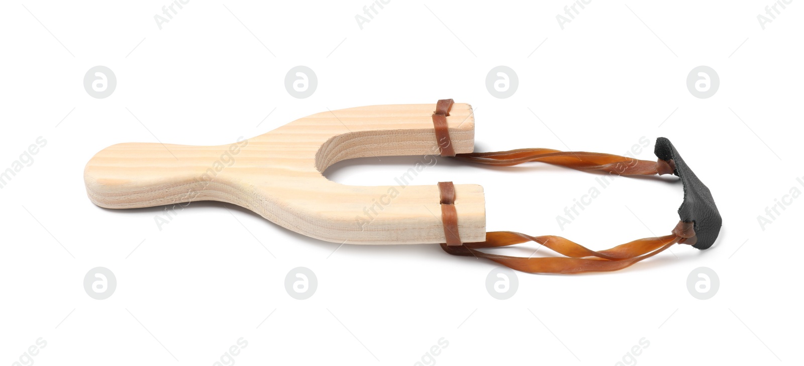 Photo of One wooden slingshot with leather pouch isolated on white