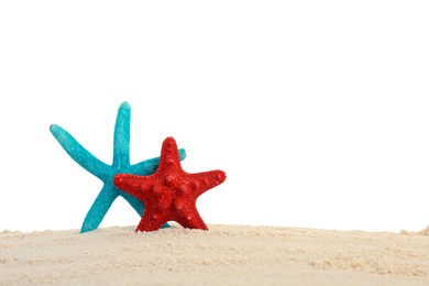 Photo of Honeymoon concept. Two sea stars and sand isolated on white