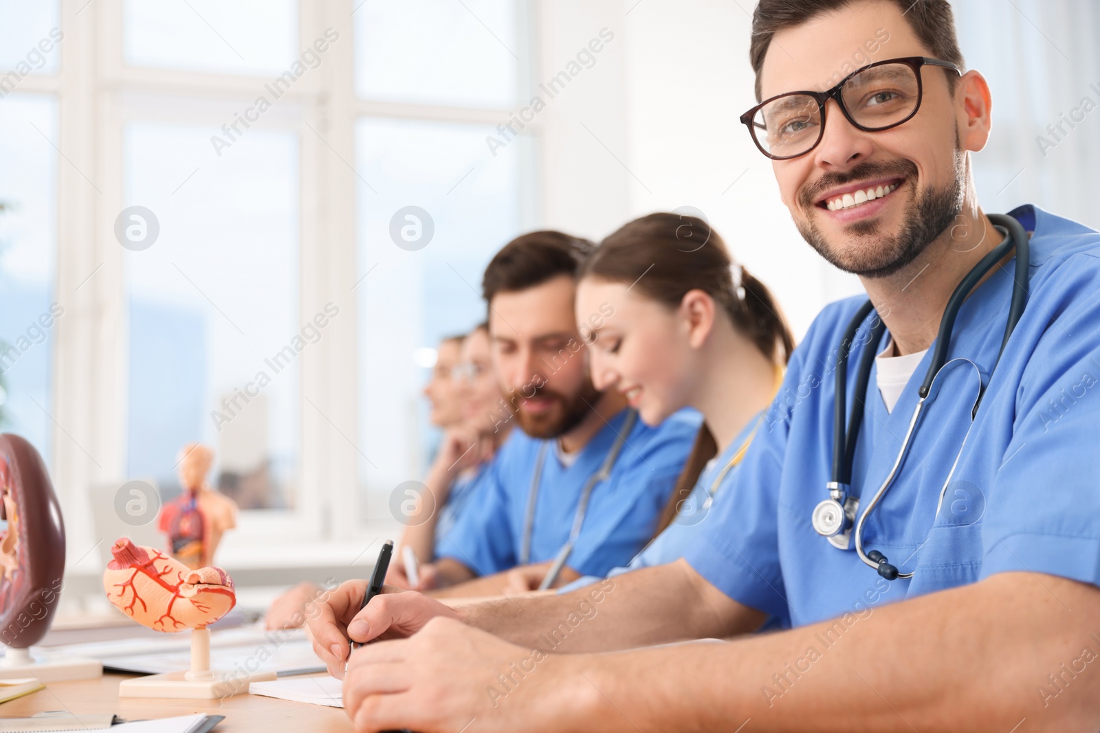 Photo of Portrait of mature intern wearing uniform on lecture in university