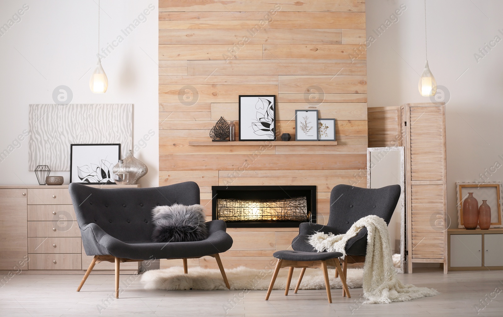 Photo of Cozy living room interior with comfortable furniture and decorative fireplace