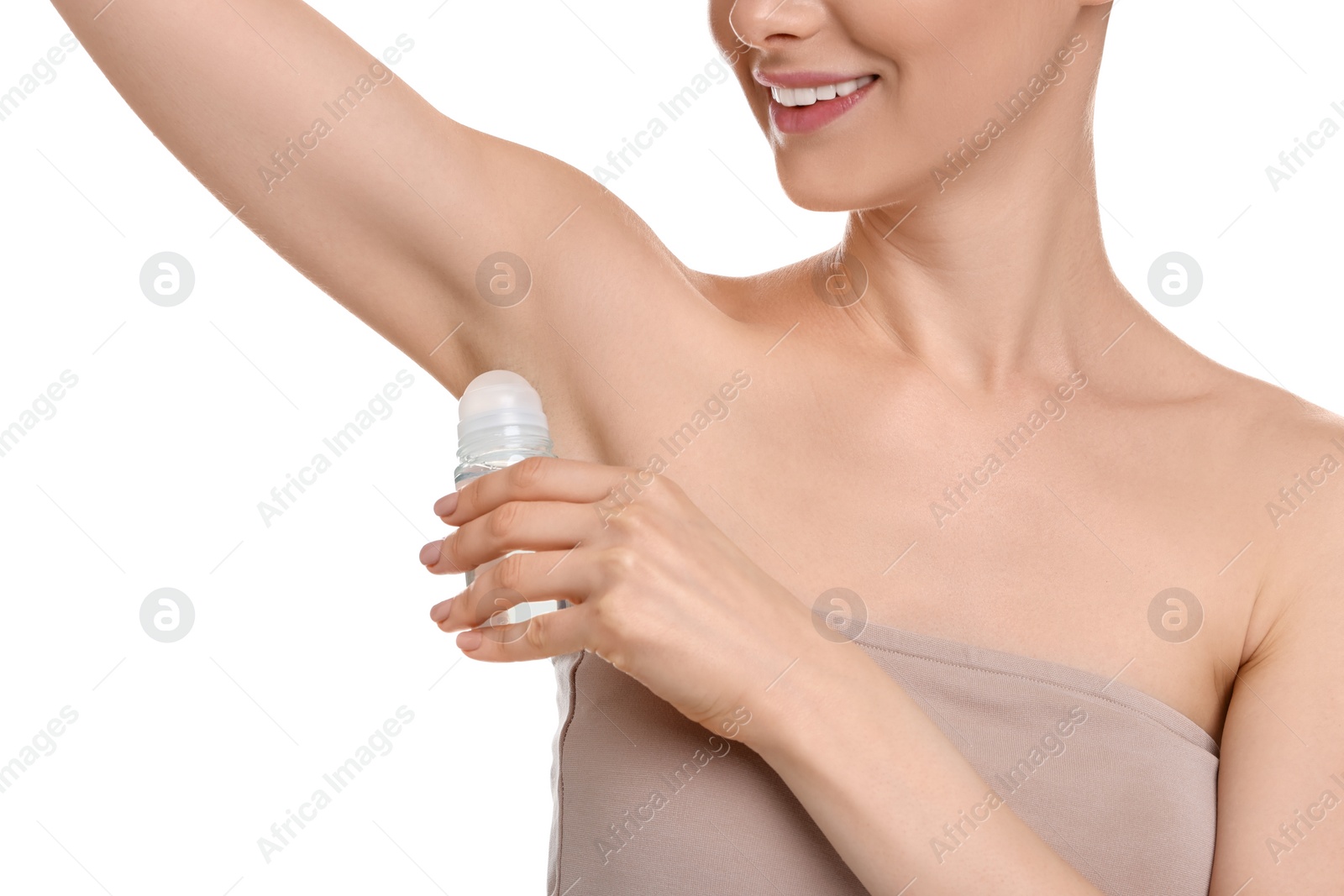 Photo of Woman applying deodorant on white background, closeup