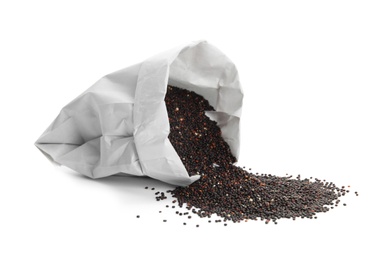 Paper bag with black quinoa on white background