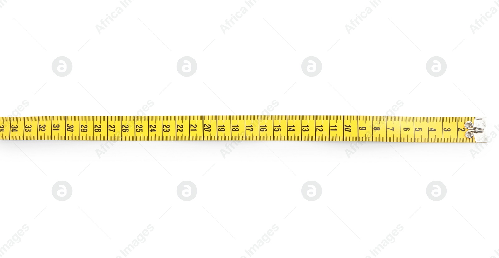 Photo of New yellow measuring tape isolated on white, top view