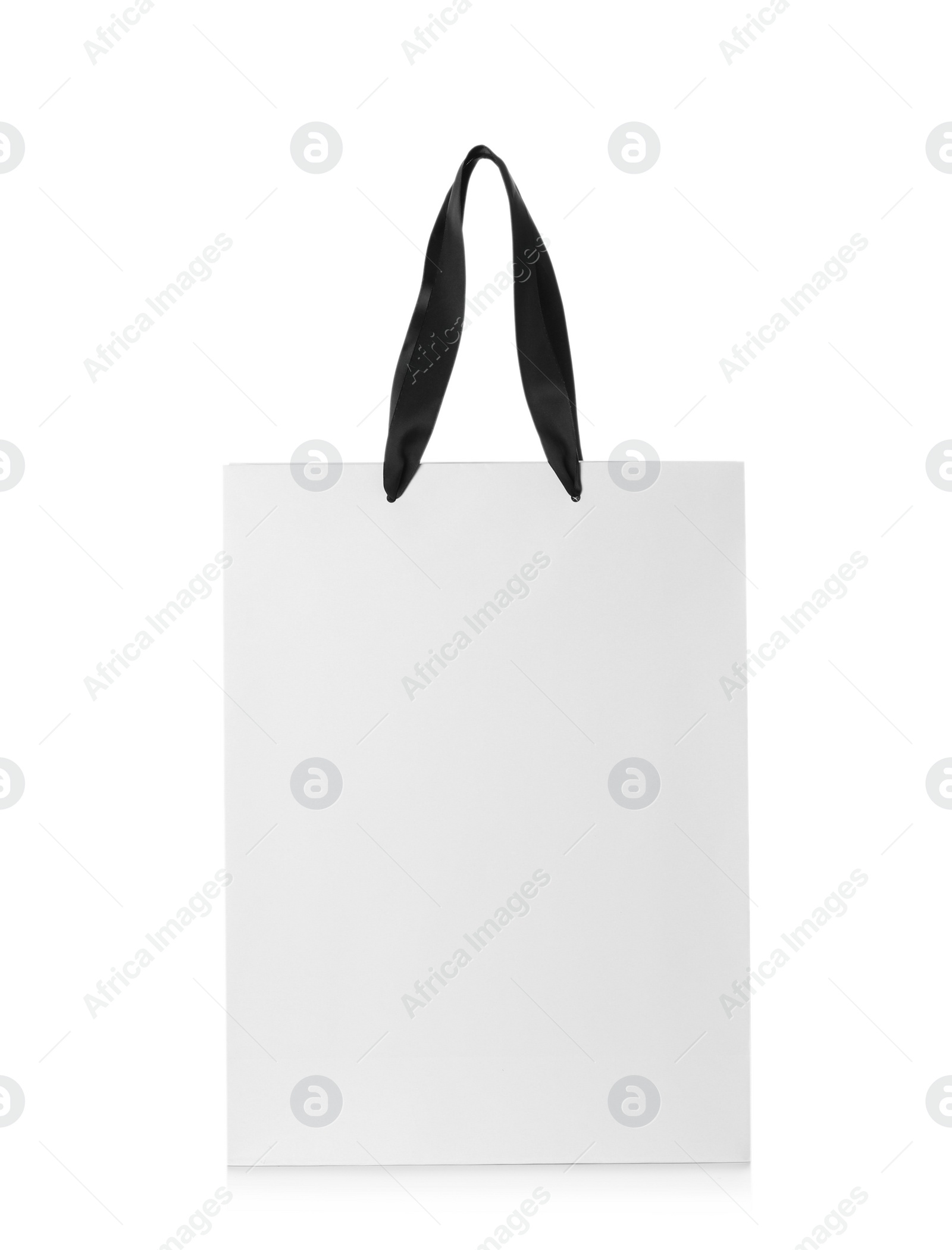 Photo of Paper shopping bag isolated on white. Mock up for design