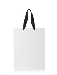 Photo of Paper shopping bag isolated on white. Mock up for design