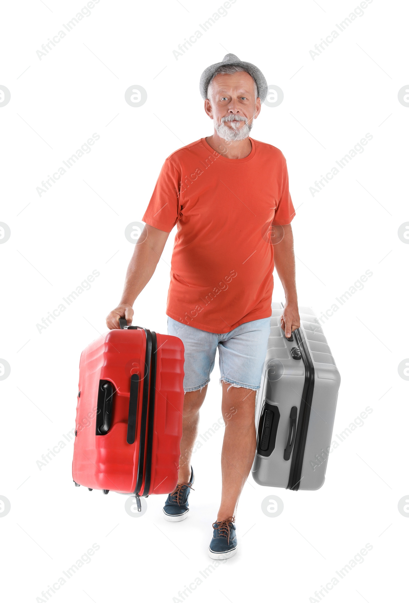 Photo of Senior man with suitcases on white background. Vacation travel