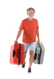 Senior man with suitcases on white background. Vacation travel