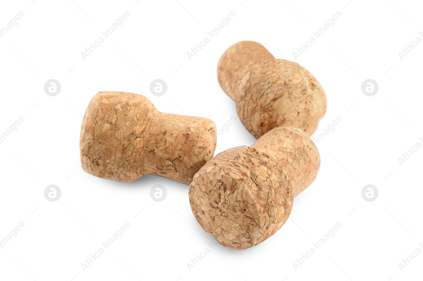 Photo of Many sparkling wine corks on white background