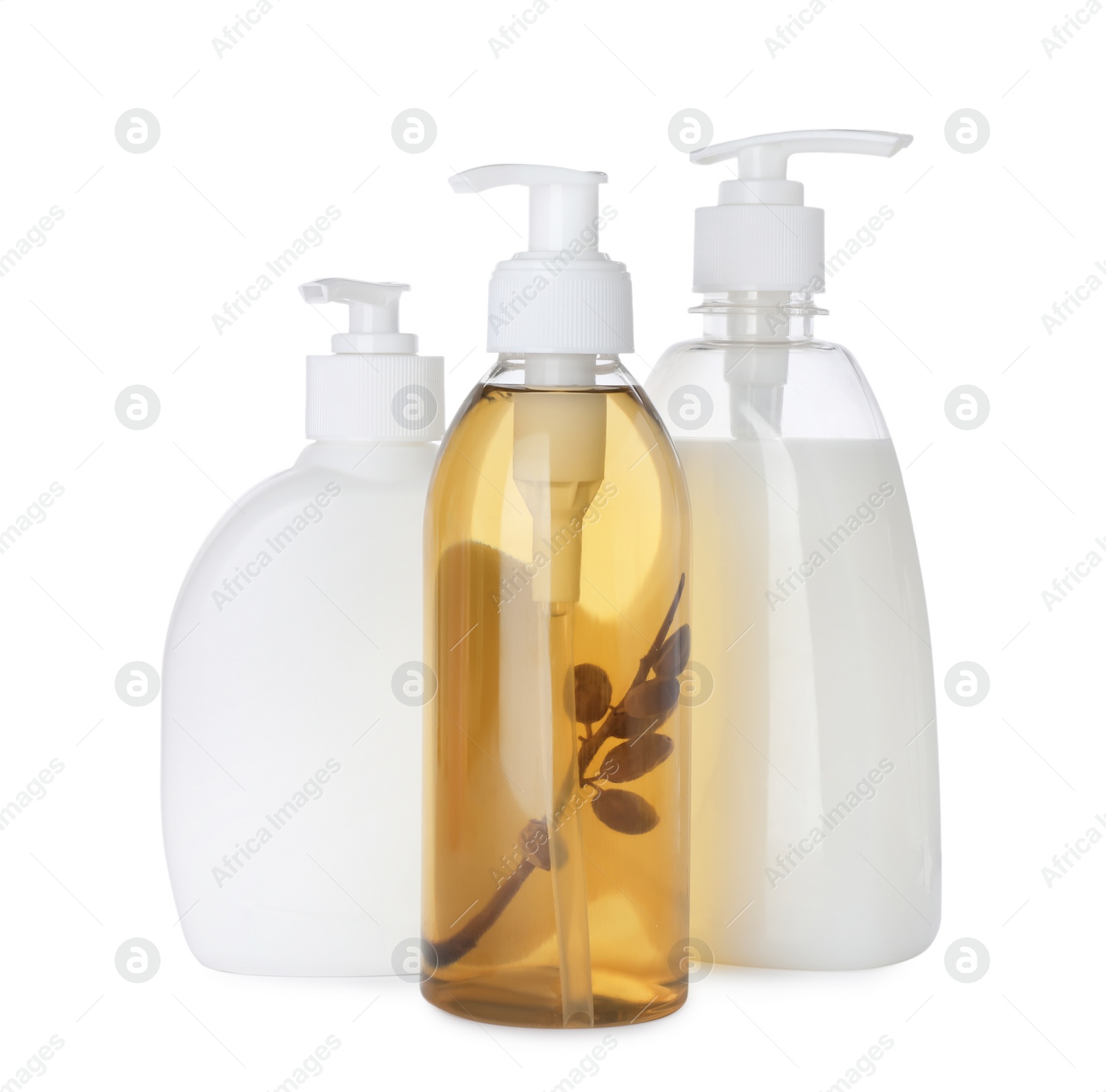 Photo of Dispensers of liquid soap on white background