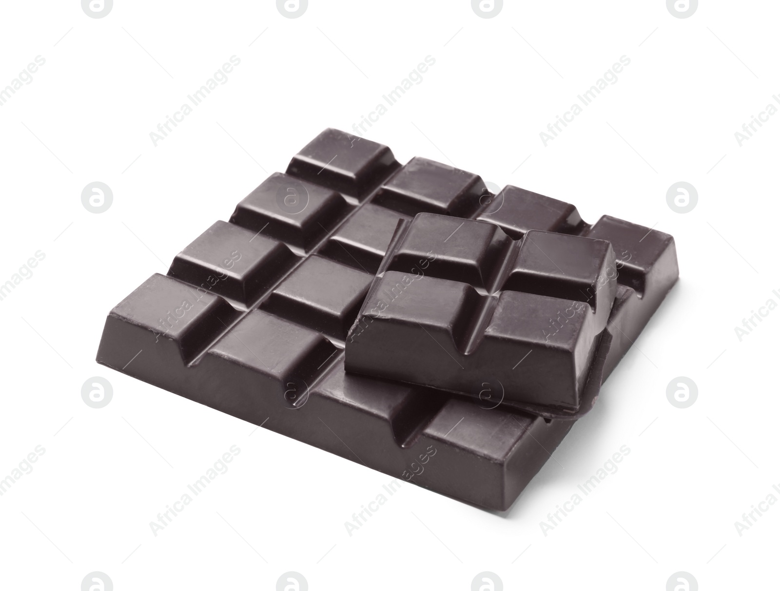 Photo of Pieces of delicious dark chocolate isolated on white