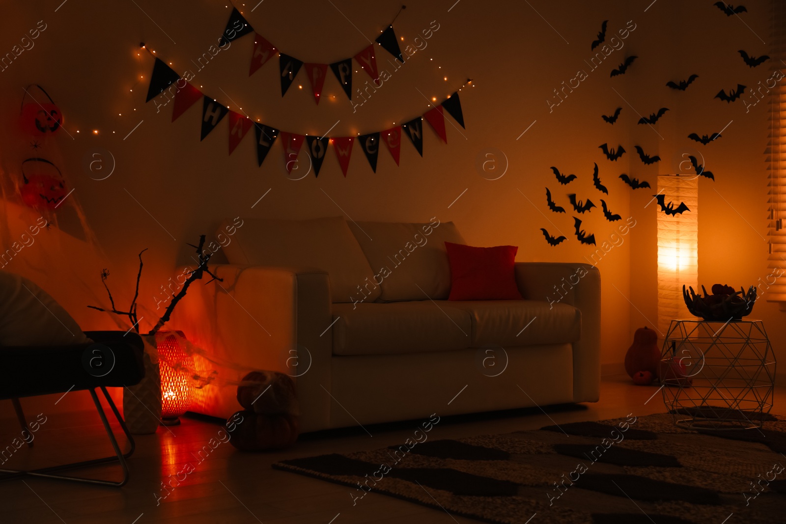 Photo of Modern room decorated for Halloween. Festive interior