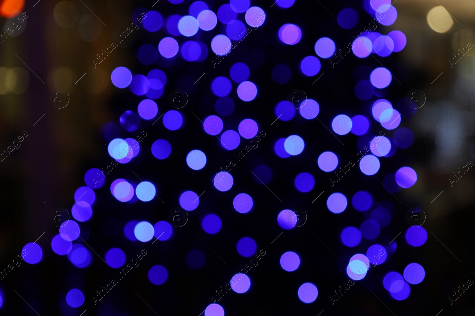 Photo of Beautiful street lights at night. Bokeh effect