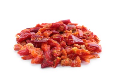 Photo of Aromatic spice. Red chili pepper flakes isolated on white