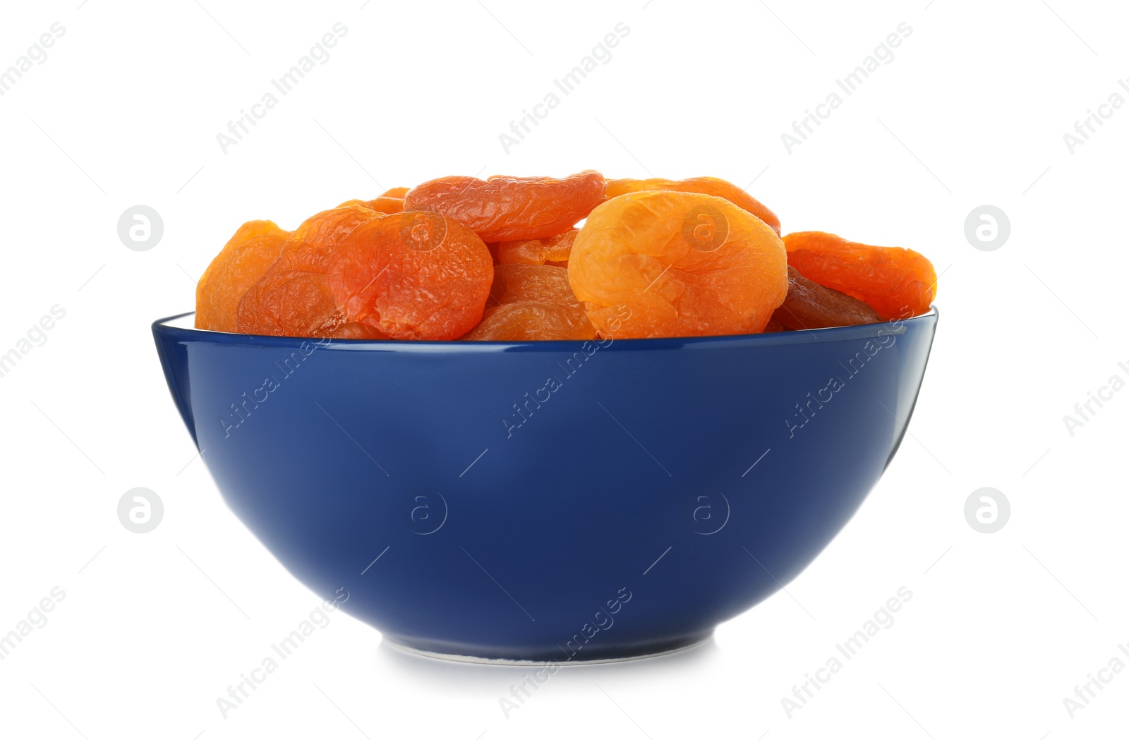 Photo of Bowl with apricots on white background. Dried fruit as healthy food
