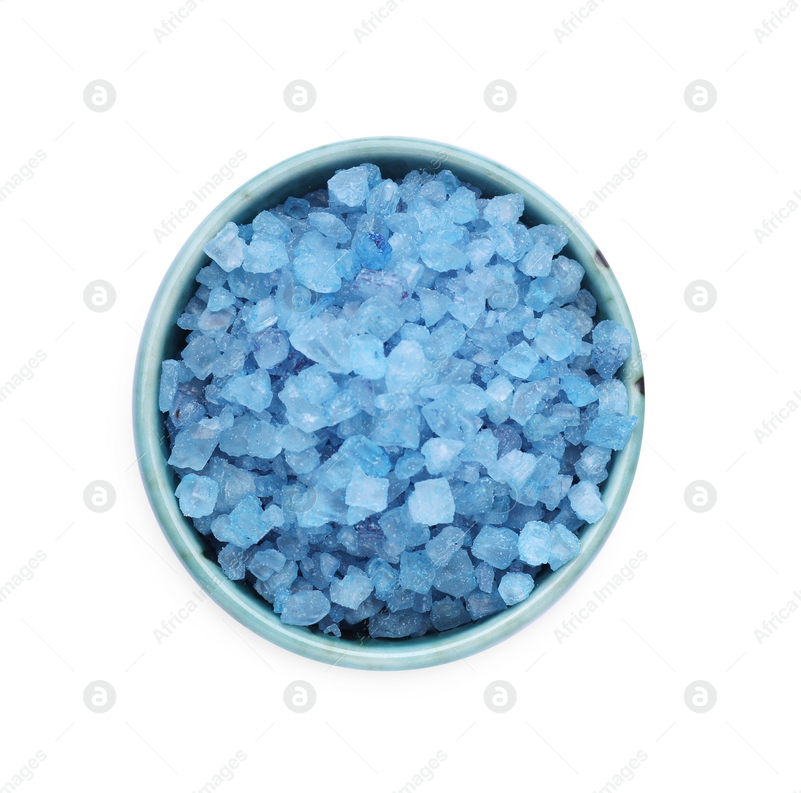 Photo of Bowl with blue sea salt isolated on white, top view