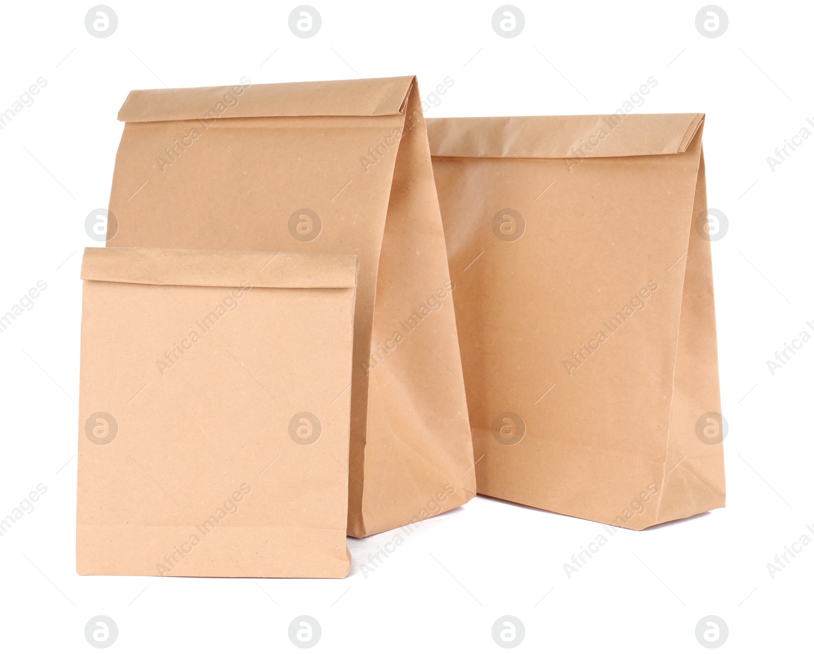 Photo of Paper bags isolated on white. Mockup for design