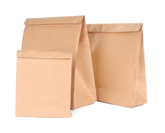 Photo of Paper bags isolated on white. Mockup for design