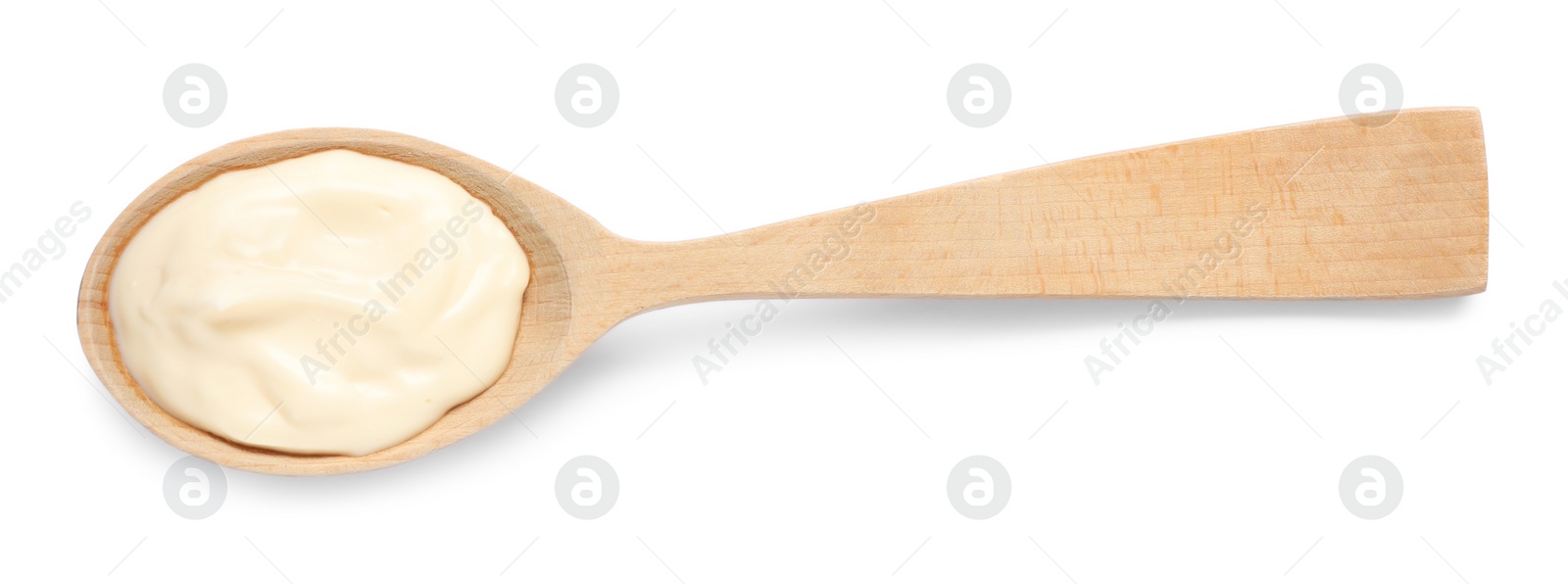 Photo of Wooden spoon with mayonnaise isolated on white, top view