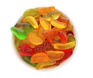 Tasty jelly fruit shaped candies in bowl on white background, top view