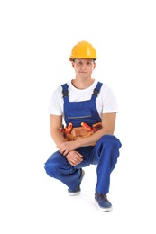 Photo of Electrician with tools wearing uniform on white background