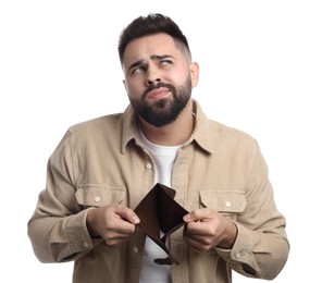 Thoughtful man showing empty wallet on white background