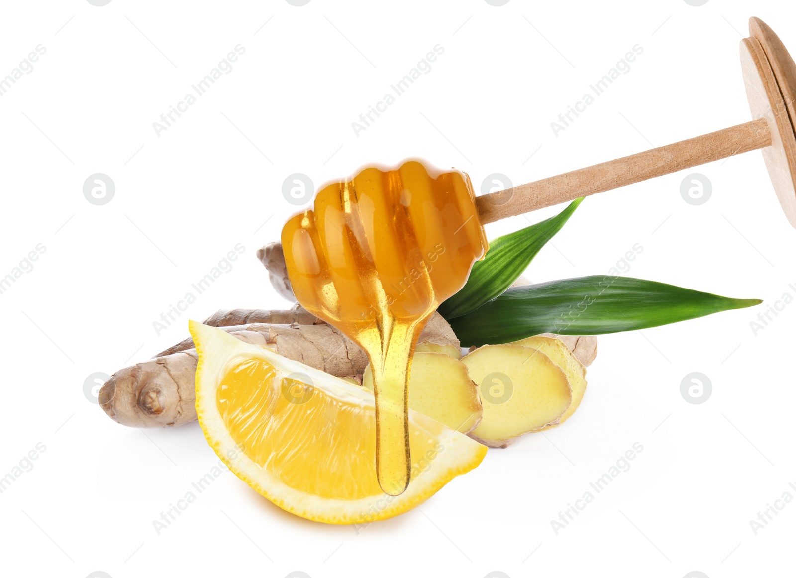 Image of Honey dripping from dipper, cut lemon and ginger root on white background