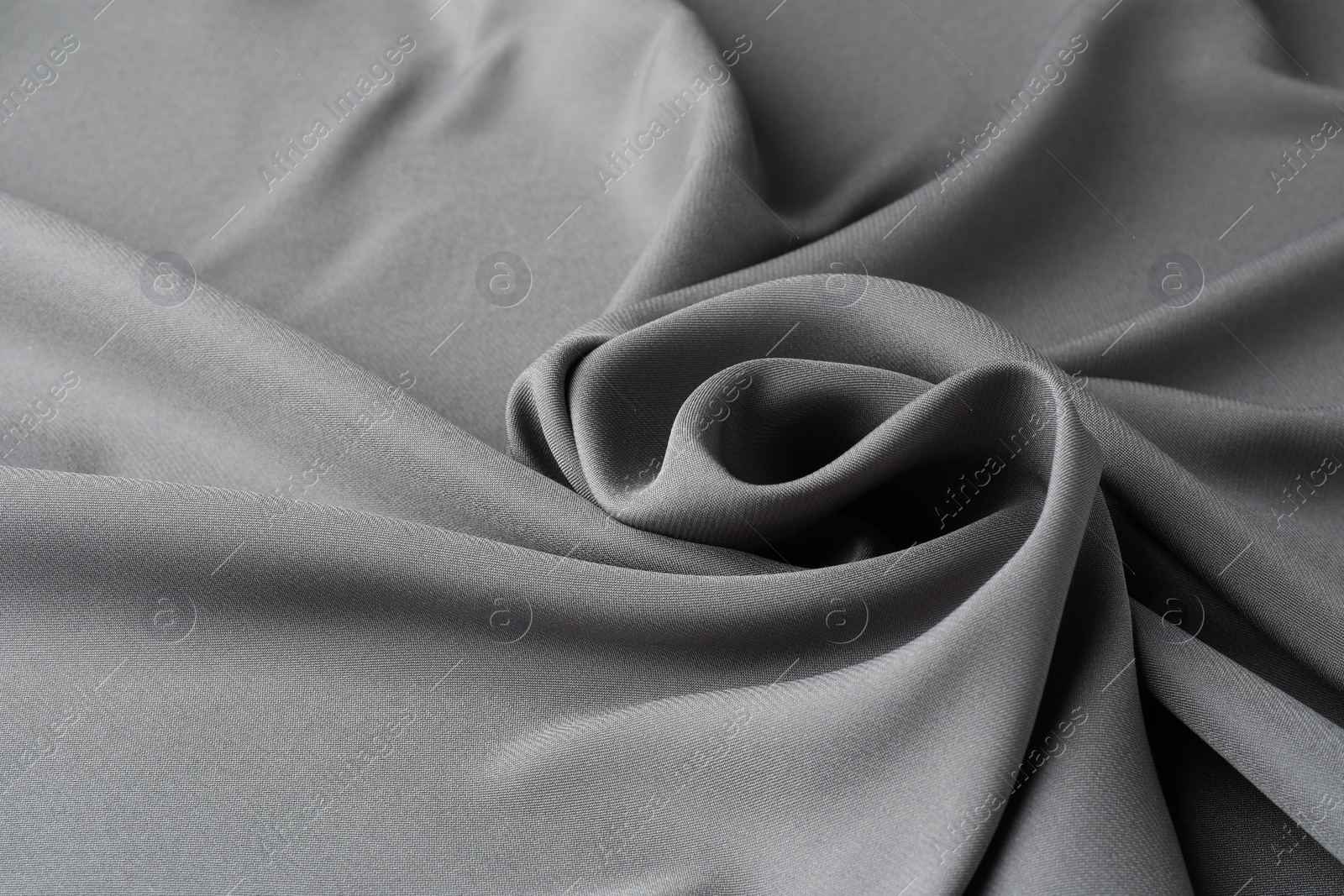 Photo of Texture of grey crumpled silk fabric as background, closeup