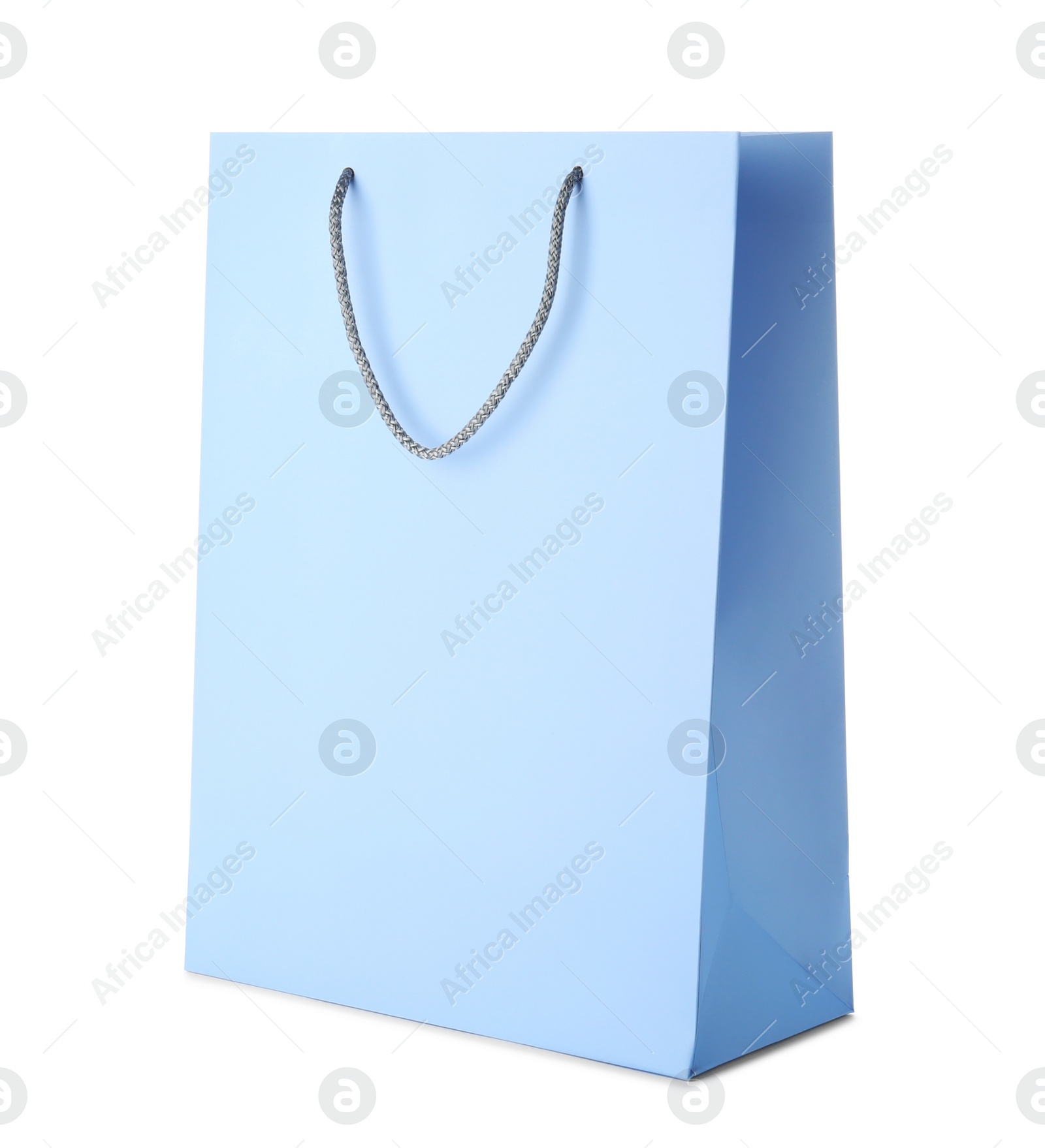 Photo of Mockup of paper shopping bag on white background