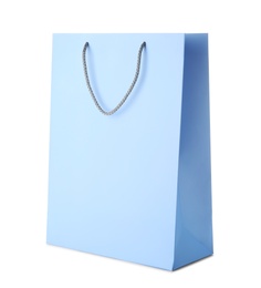 Photo of Mockup of paper shopping bag on white background