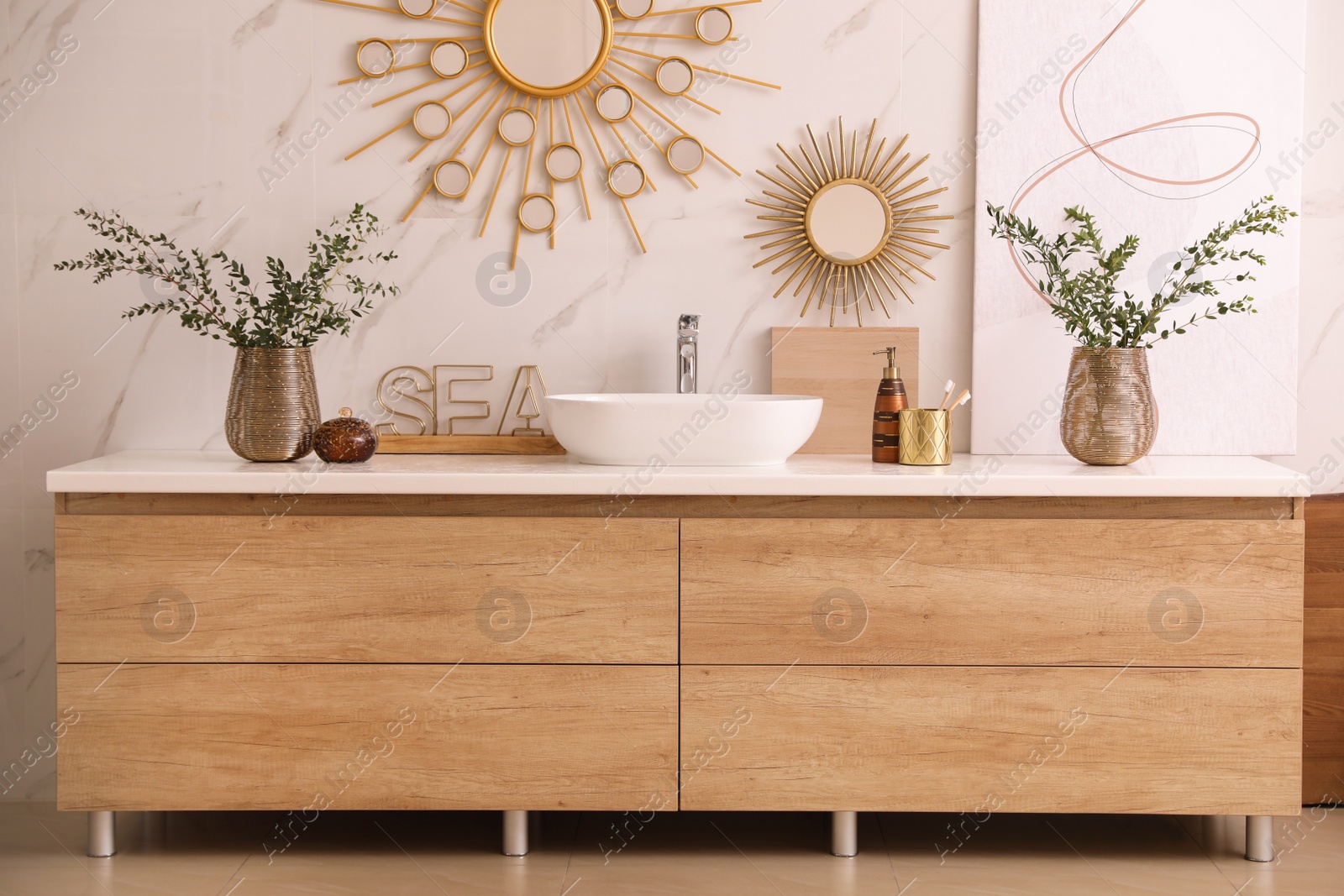 Photo of Modern bathroom interior with stylish mirror and vessel sink