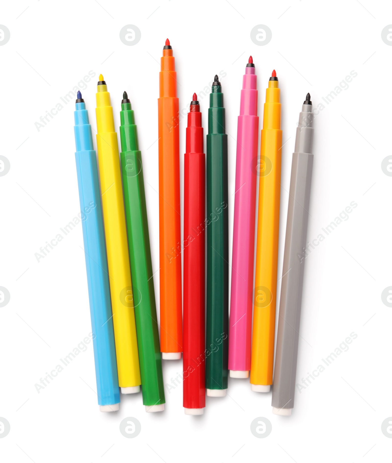 Photo of Many bright markers isolated on white, top view