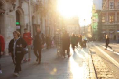 Blurred view of people walking on city street