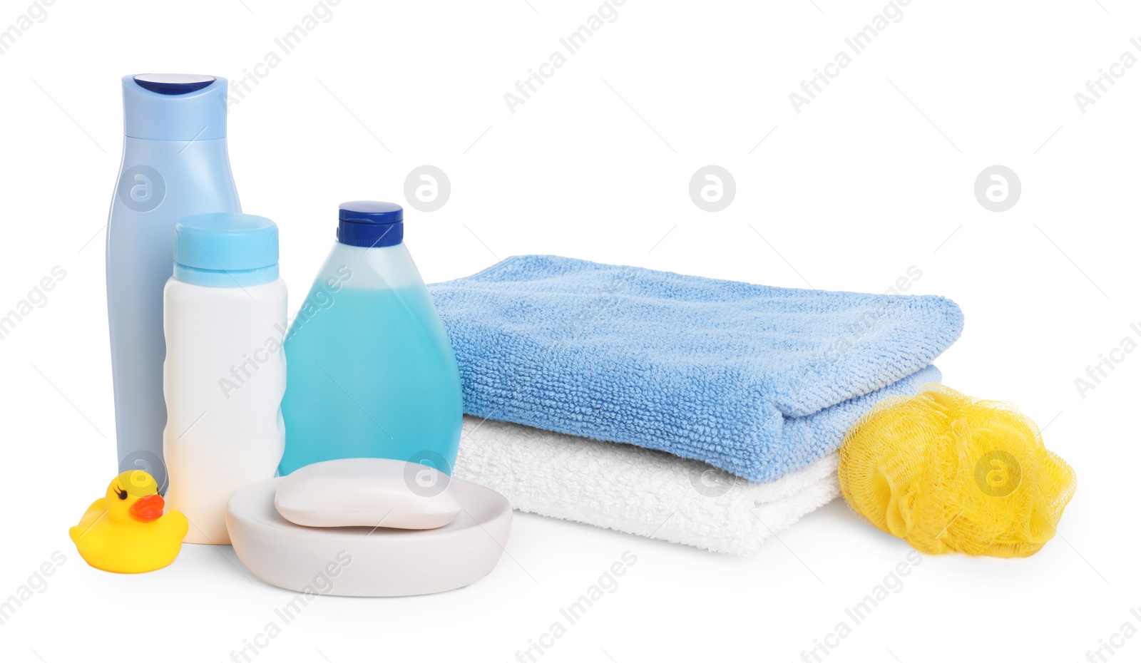 Photo of Baby cosmetic products, bath duck, sponge and towels isolated on white