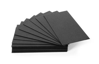 Photo of Many blank black business cards isolated on white. Mockup for design