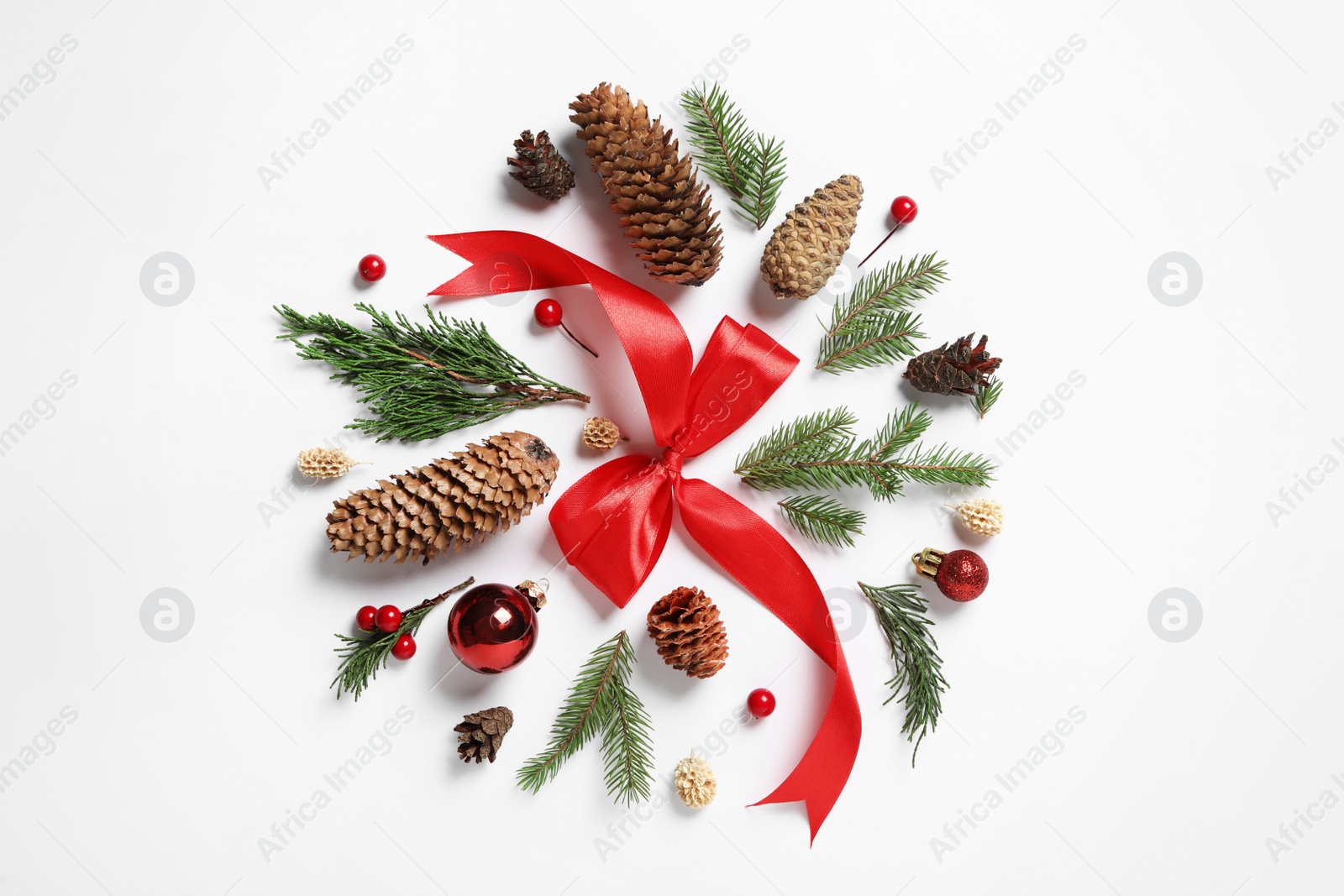 Photo of Flat lay composition with pinecones on white background