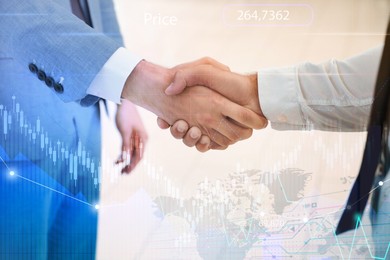 Deal or partnership concept. Double exposure with world map, charts and photo of businesspeople shaking hands